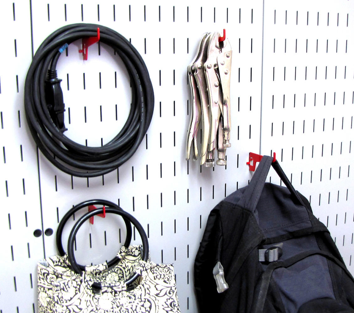 Wrench on Pegboard Wall Control Hooks in Use