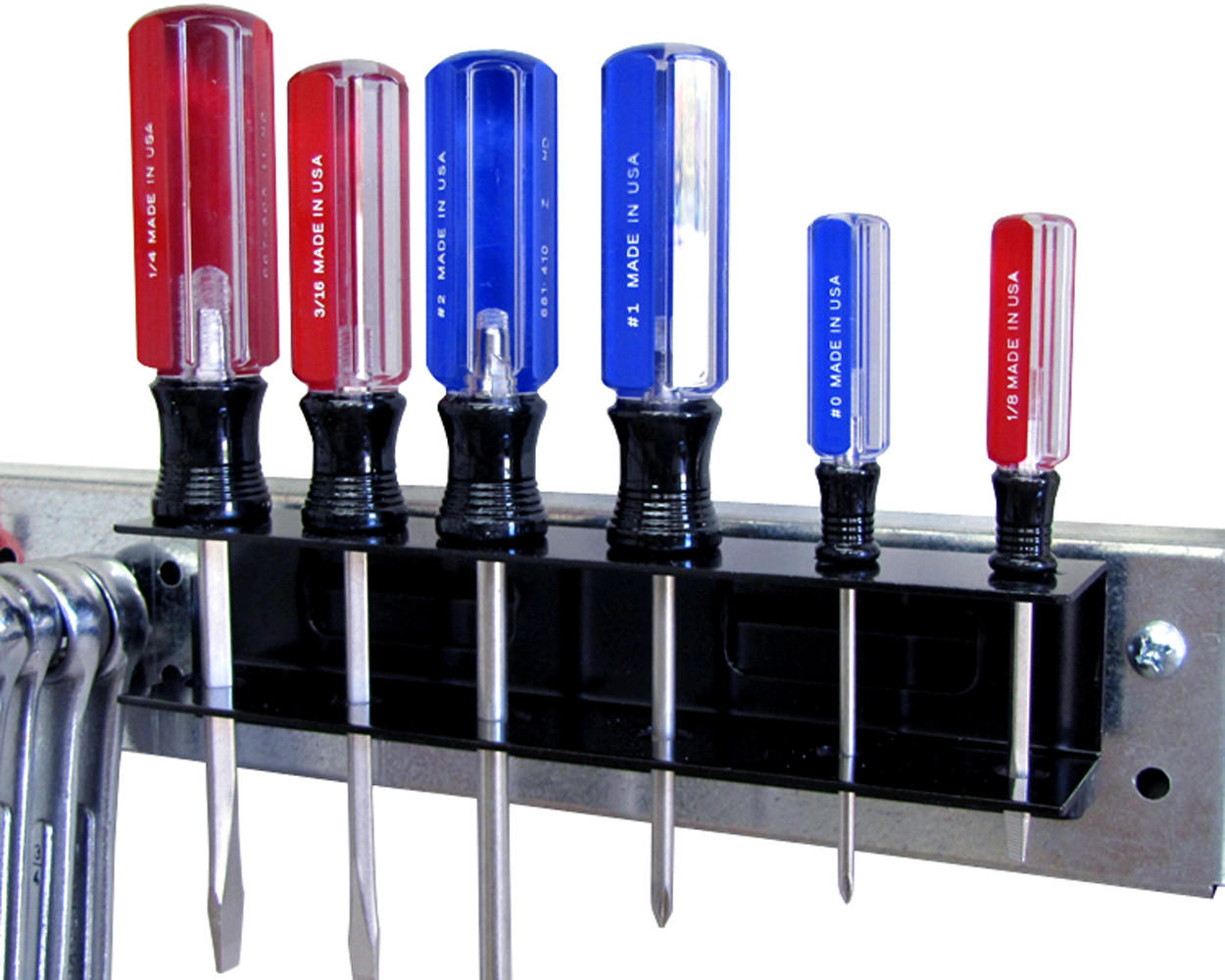 Screw Drivers on Peg Boards by Wall Control
