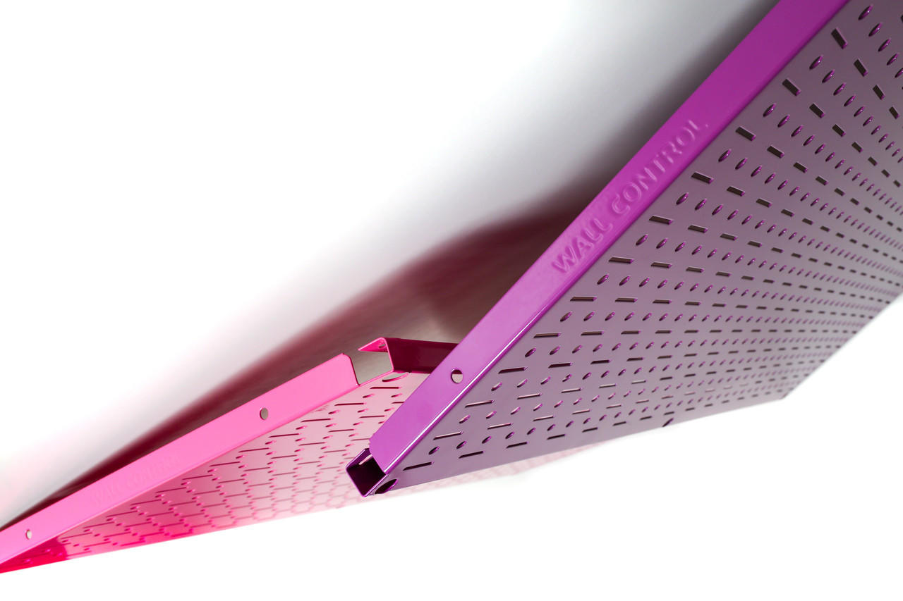 Purple Metal Pegboard Next to Pink Pegboard