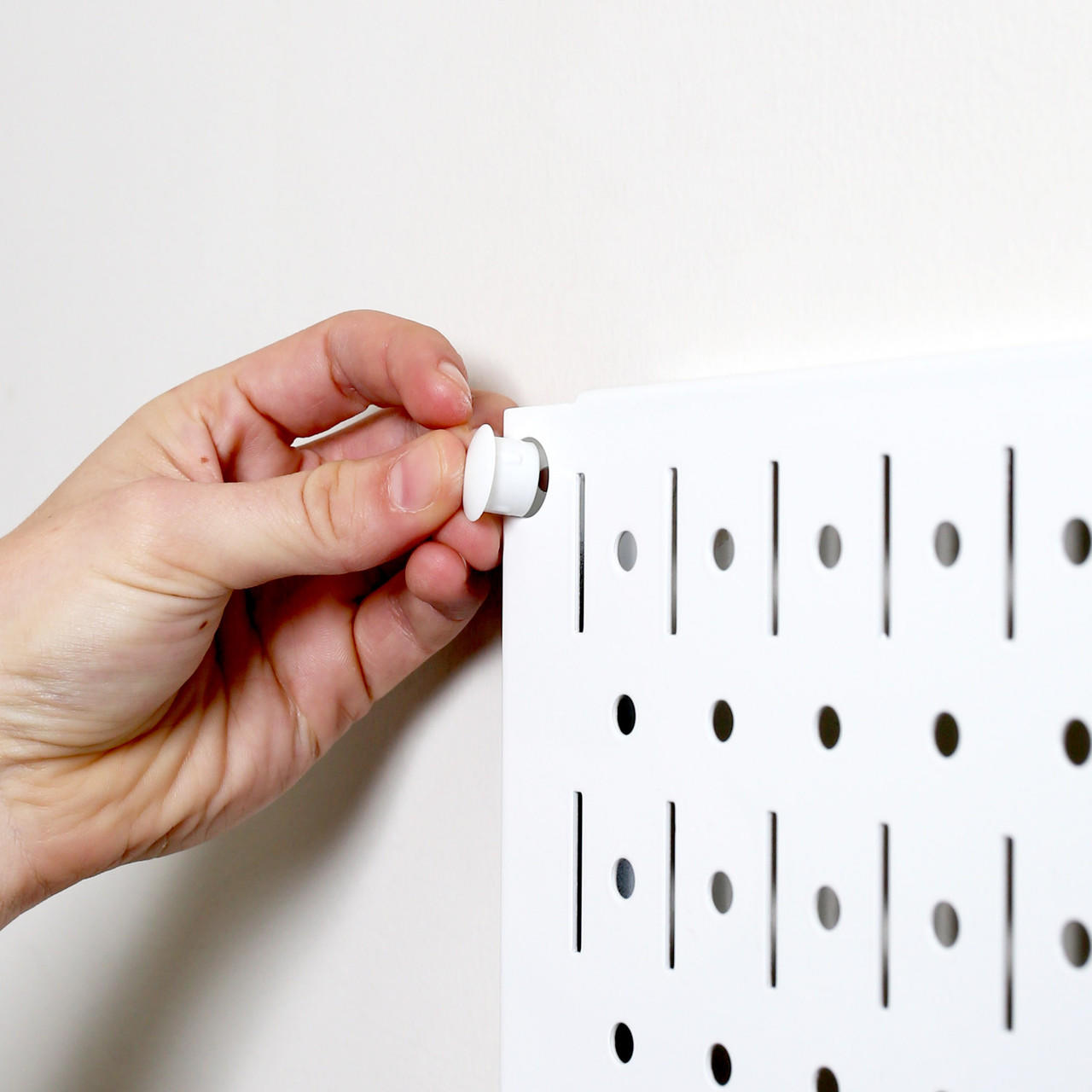 Plastic Plugs for Pegboard Mounting Holes