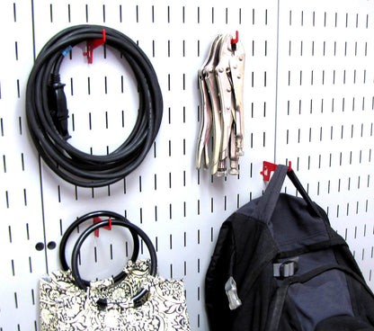 Wrench on Pegboard Wall Control Hooks in Use