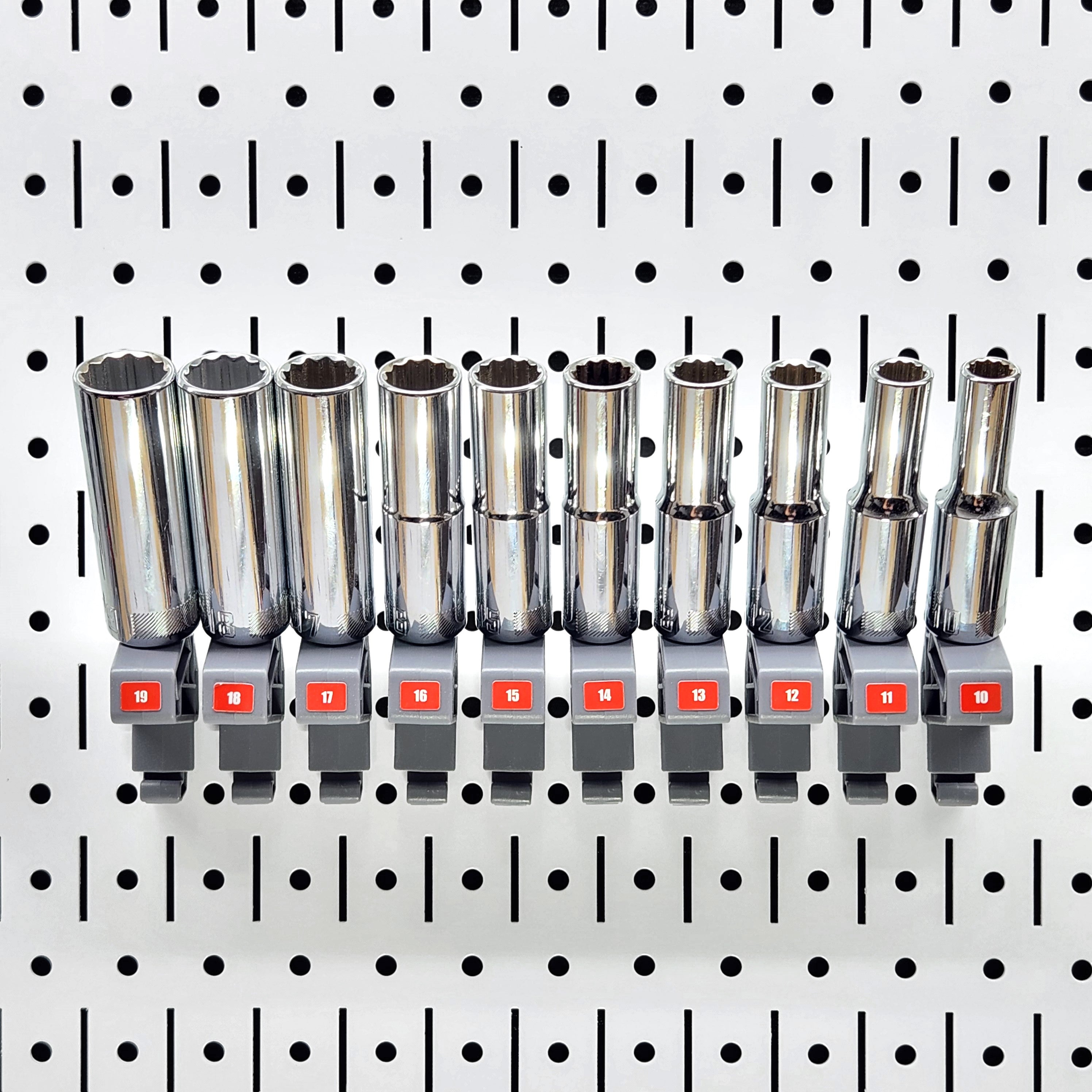 TROPEK™ 103 Brackets holding various socket sizes in adjacent slots for easy organization.