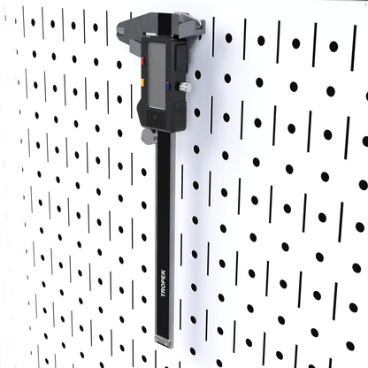 TROPEK™ 116 Caliper Bracket securely holding a 6-inch digital caliper on a Wall Control™ panel.
