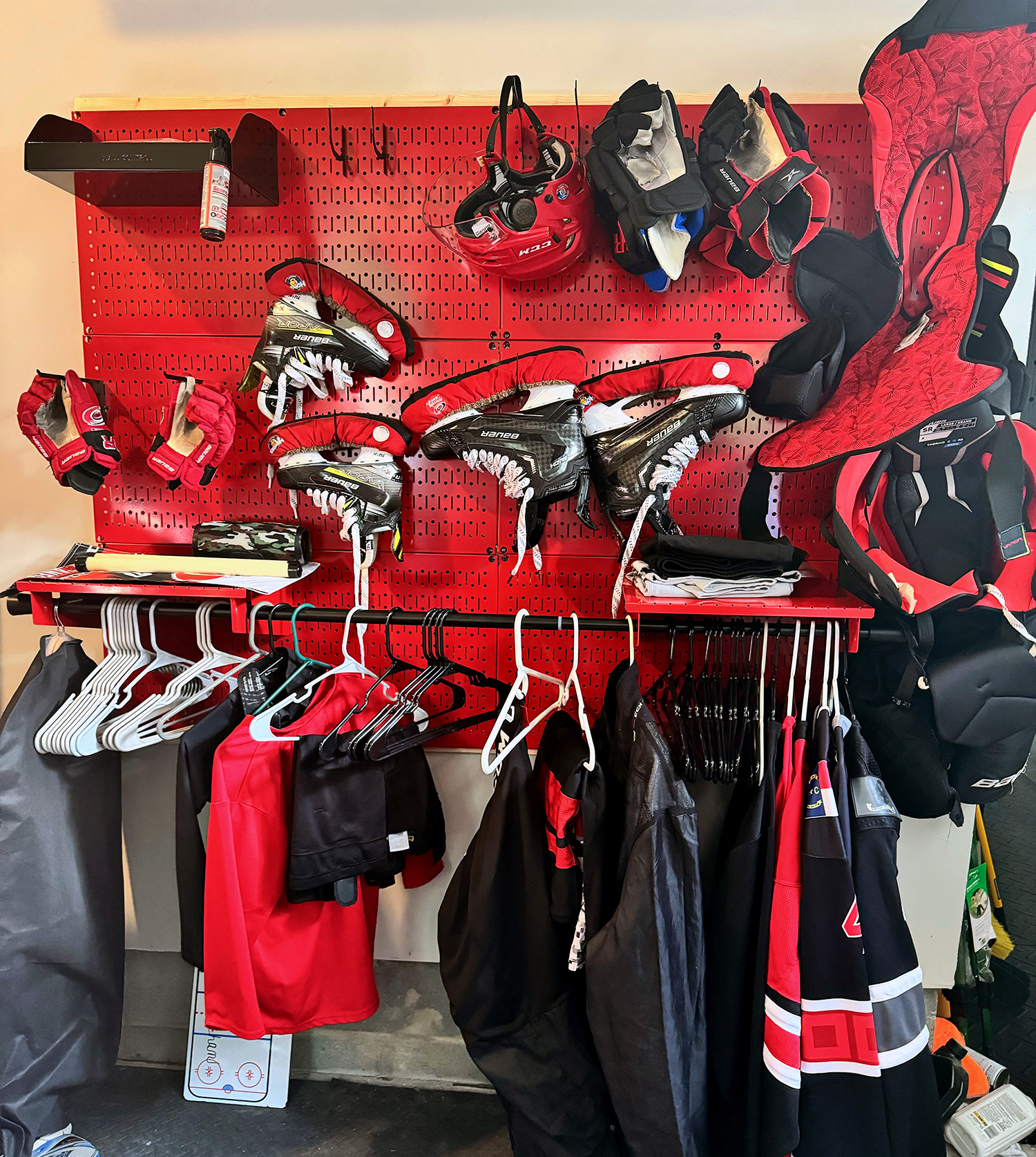 Metal Pegboard Wall Panels for Storing Sporting Goods